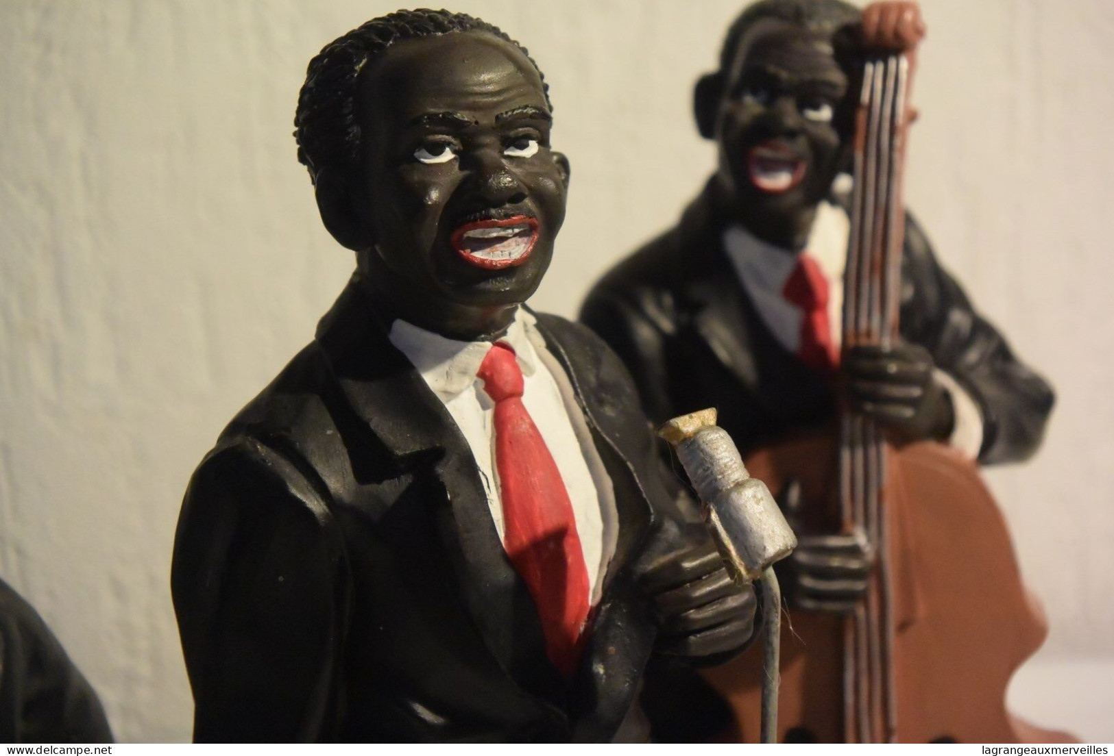 C44 Magnifique groupe de musiciens noirs avec instruments USA