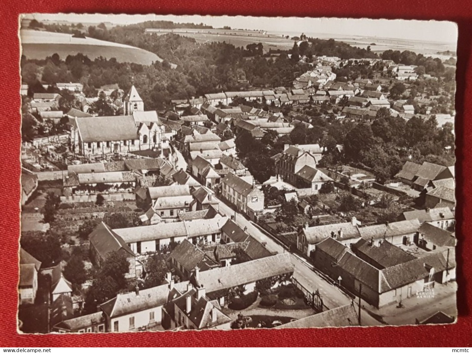 CPSM Grand Format - En Avion Au-dessus De ...  Naours -(Somme) - La Rue Principale Et L'église XIIIe Siècle - Naours