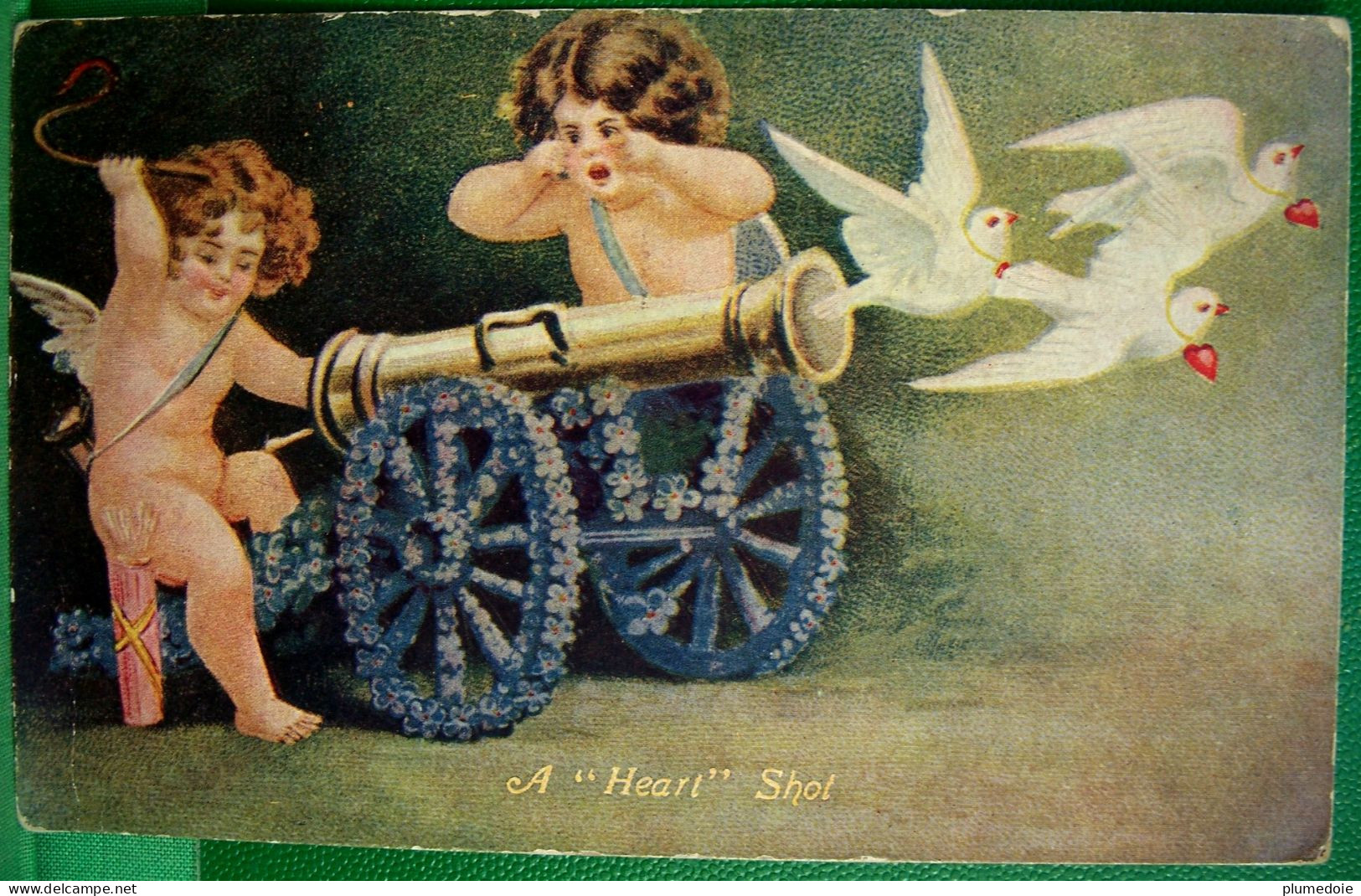 Cpa  ANGE  ANGES , CUPIDON  CANON , COLOMBES , 1917 , A HEART SHOT CHERUBS  CUPID GUN DOVES OLD PC - Valentine's Day