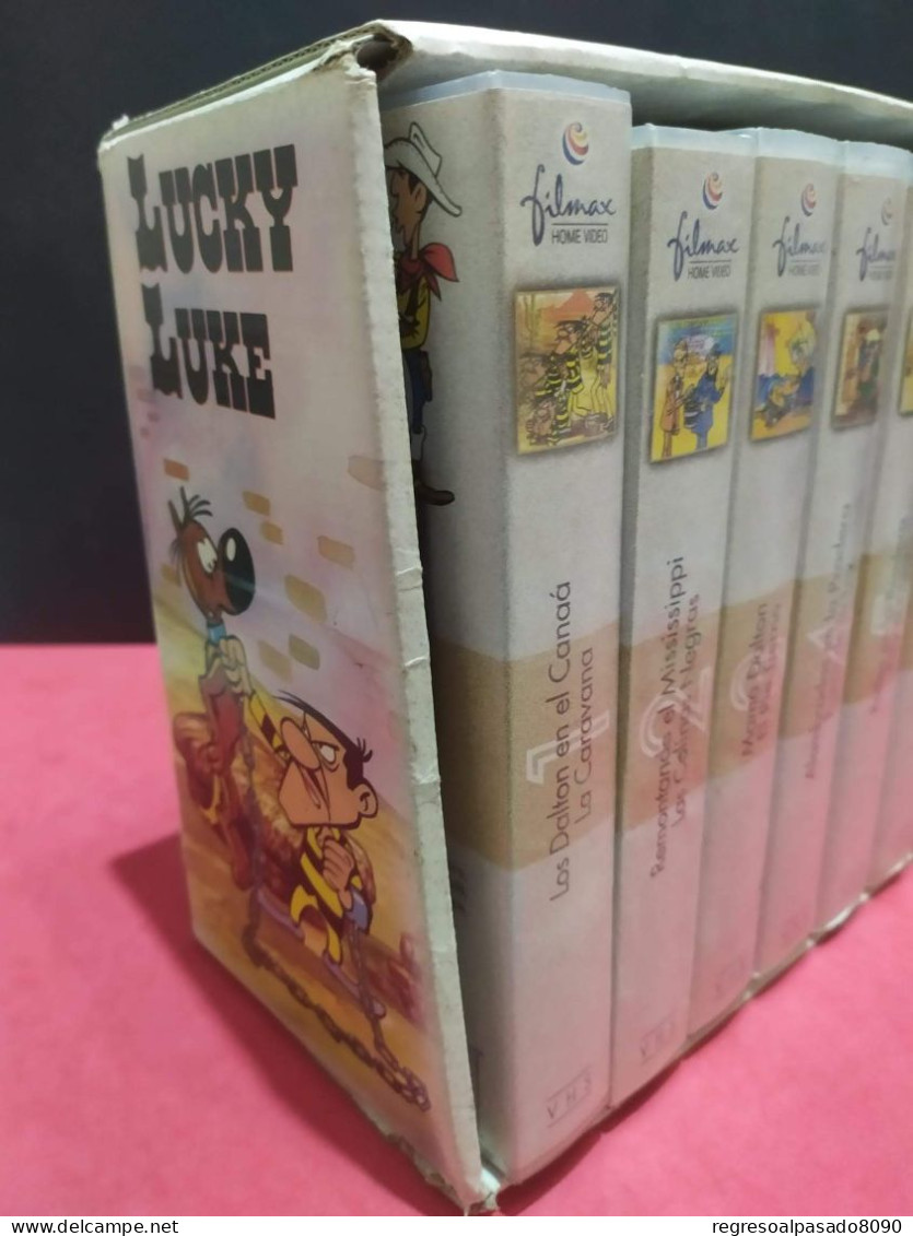 Colección Completa Con Caja Expositora Antiguas Películas Cintas De Vídeo Cassette VHS Lucky Luke - Collezioni & Lotti