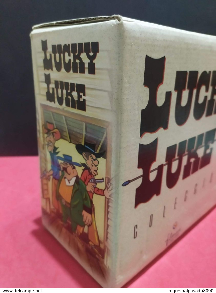 Colección completa con caja expositora antiguas películas cintas de vídeo cassette VHS lucky luke