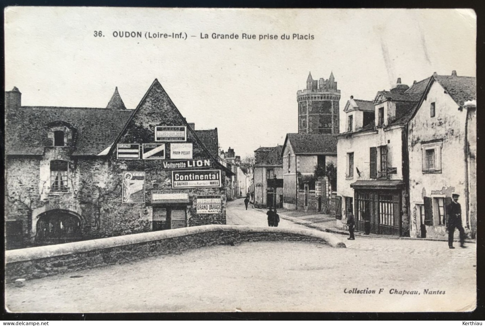 RARE - Oudon - La Grande Rue Prise Du Placis. Animée, BELLES PUBLICITES MURALES. CIrculée 1917 - Oudon