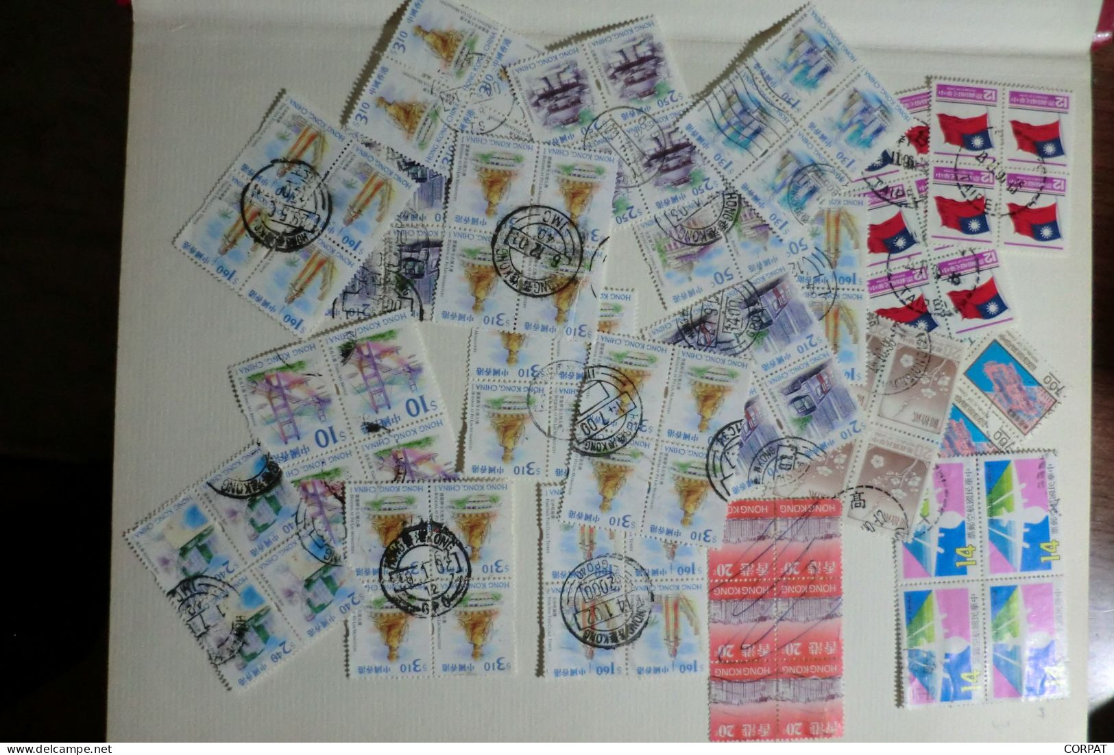 China with Hong Kong and Taiwan used stamps in album and a lot of stamps out the album  (12 photos)