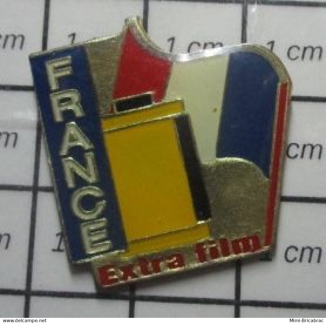 911D Pin's Pins / Beau Et Rare / PHOTOGRAPHIE / ROULEAU DE PELLICULE ARGENTIQUE EXTRA FILM DRAPEAU FRANCE - Photography