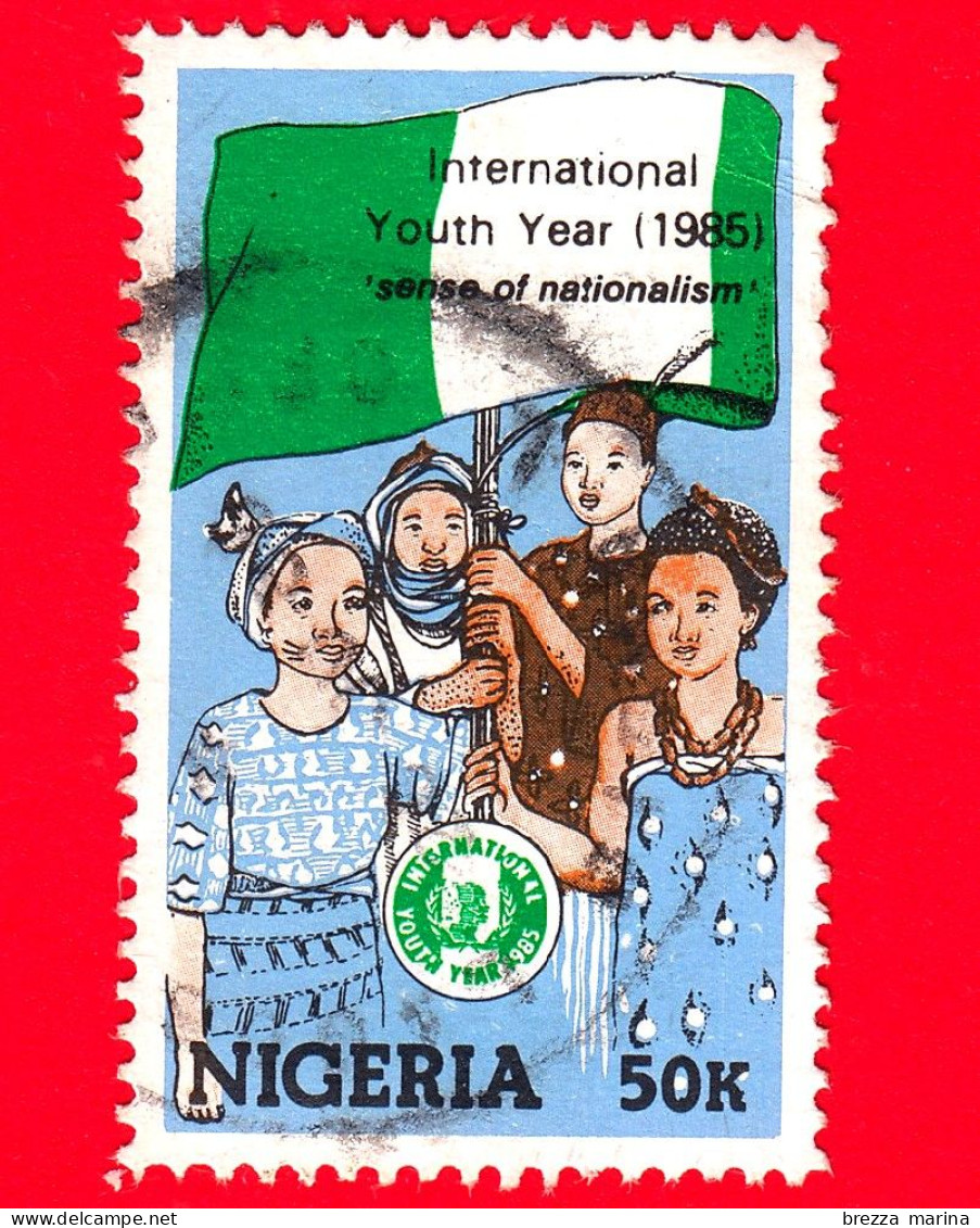NIGERIA  - Usato - 1985 - Anno Internazionale Dei Giovani - Gioventù Con Bandiera Nazionale - 50 - Nigeria (1961-...)