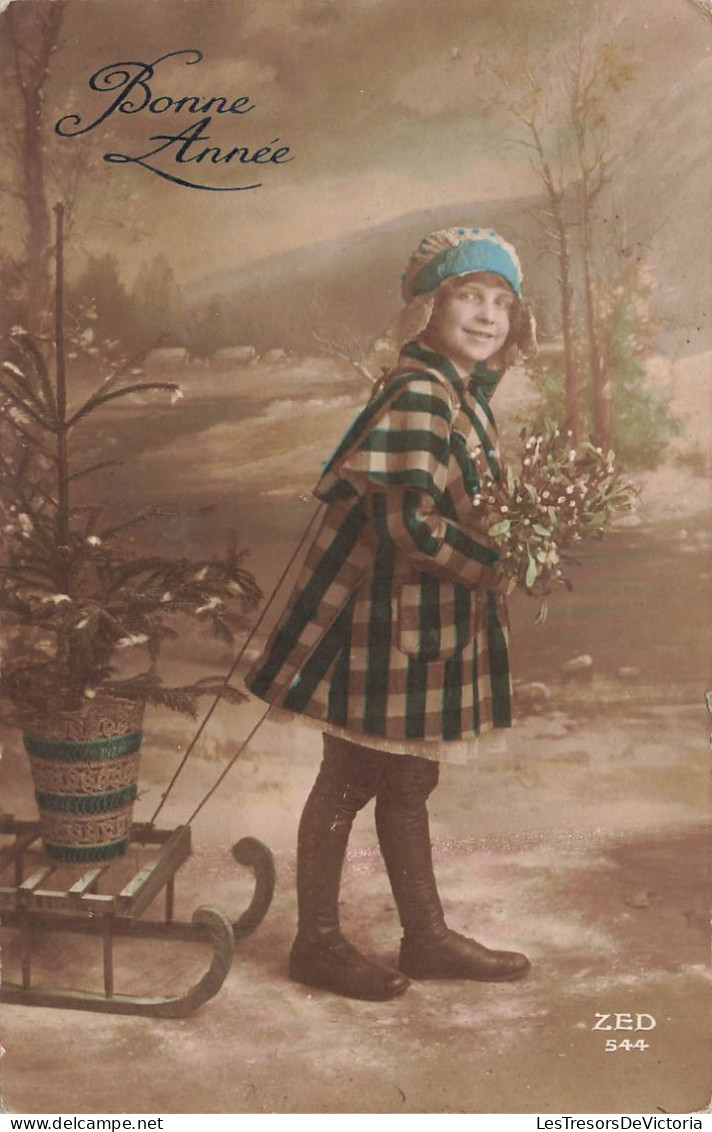 FETES - VOEUX - Nouvel An - Bonne Année - Jeune Fille Avec Un Bouquet De Fleur Dans Sa Main - Carte Postale Ancienne - Nouvel An