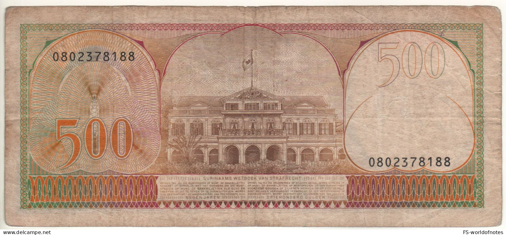 SURINAME   500  Gulden  P129    1982 ( Monument Of Revolt + People's Palace At Back )  UNC - Suriname