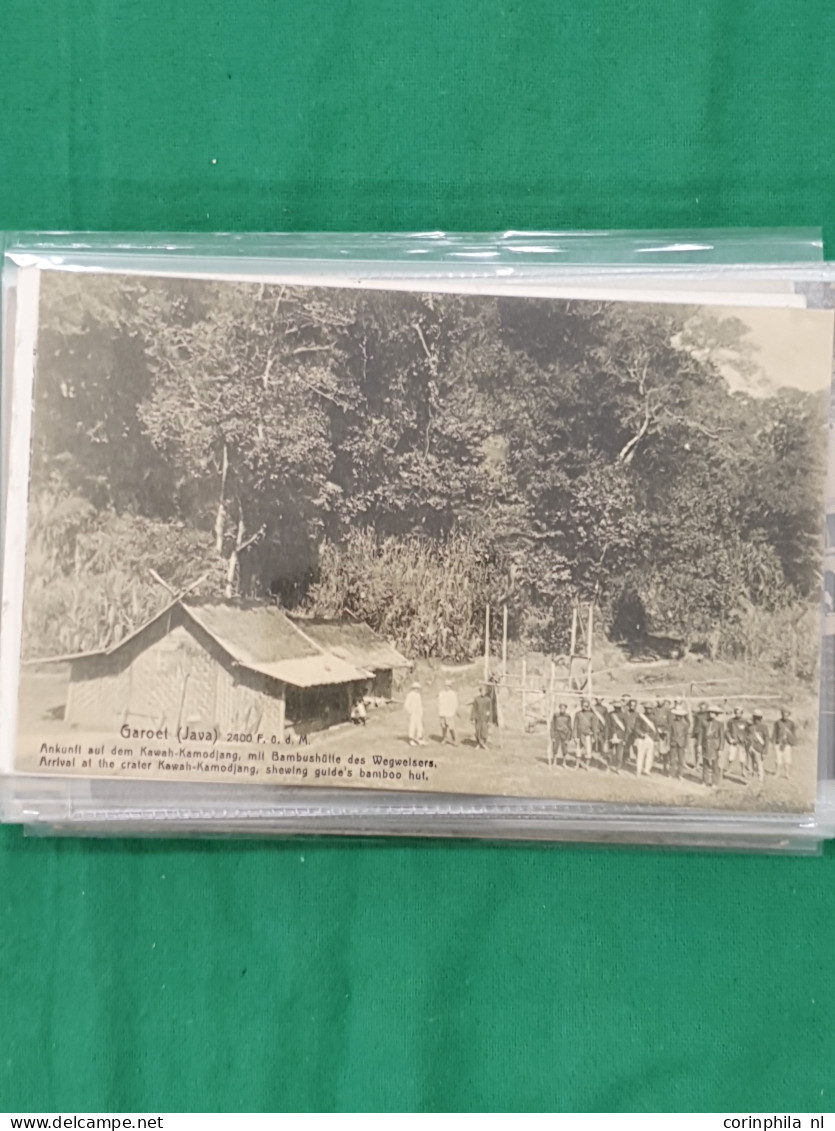 Cover Dutch East Indies, approx. 100 postcards all pre 1940 including ethnic scenes in envelope