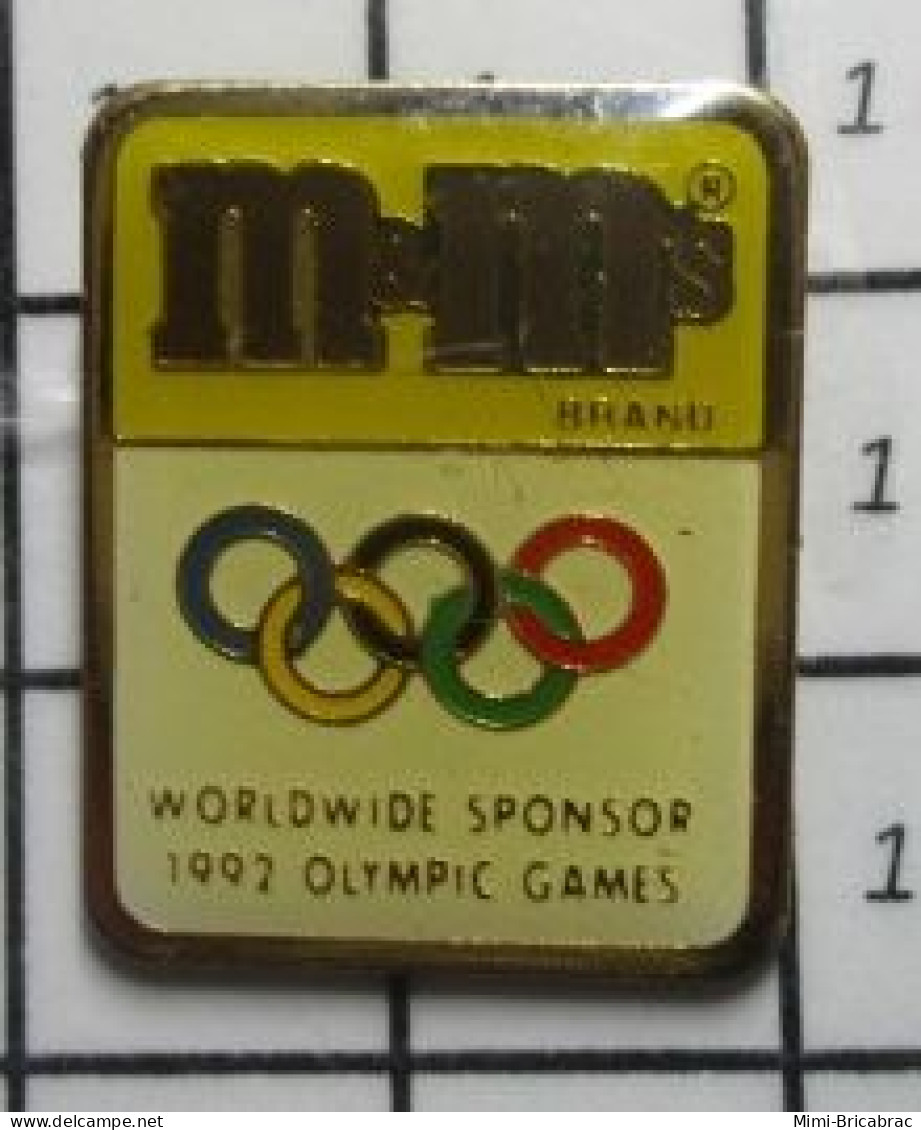 715a Pin's Pins / Beau Et Rare / JEUX OLYMPIQUES / M&M'S WORLDWIDE SPONSOR 1992 OLYMPIC GAMES - Jeux Olympiques