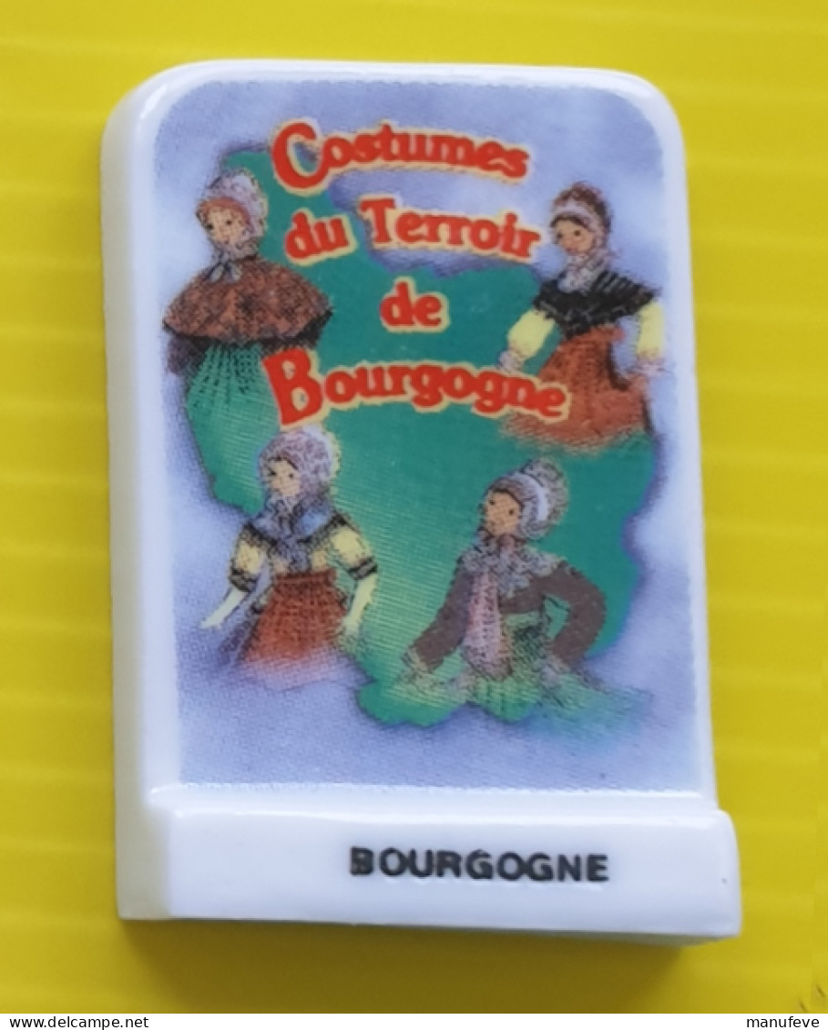 Fève - Debusne -  - Costumes De Terroirs De Bourgogne - Plaque Logo - Regionen