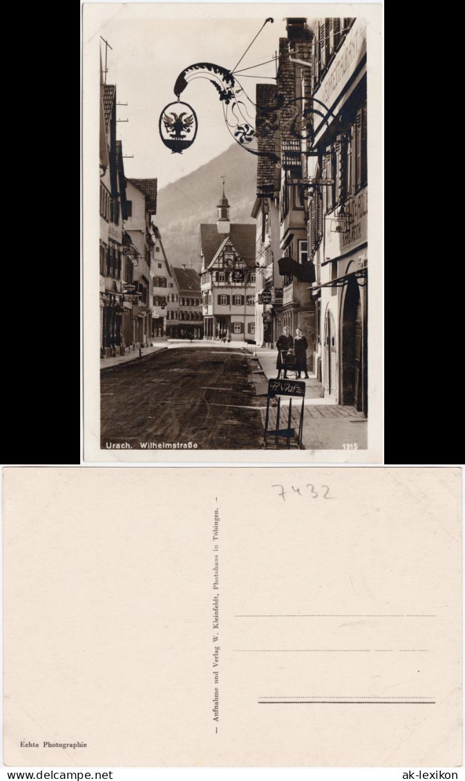 Ansichtskarte Bad Urach Wilhelmstraße - Geschäfte 1932  - Bad Urach