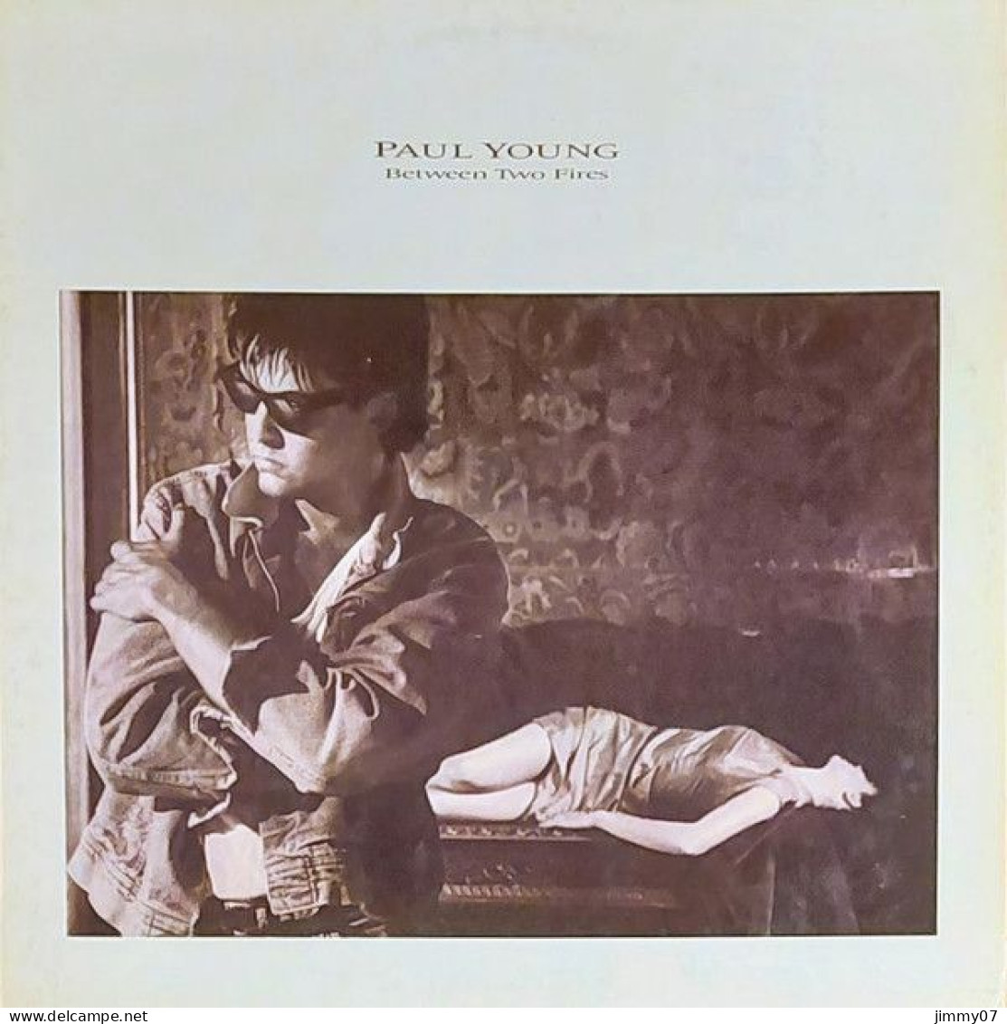 Paul Young - Between Two Fires (LP, Album) - Disco & Pop