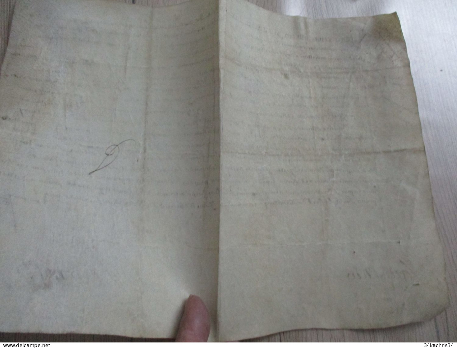 1665 pièce signée sur velin Mernost? Igaulhée condamnation à payer à déchiffrer