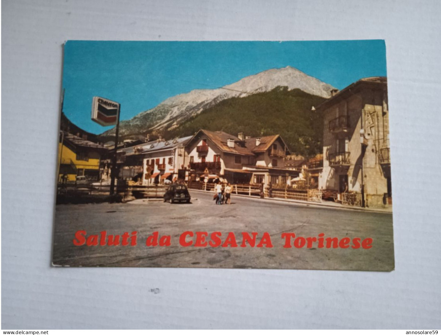 CARTOLINA: SALUTI DA CESANA TORINESE (ANIMATA, AUTO D'EPOCA) F/G - COLORI - NON VIAGGIATA - LEGGI - Rivoli