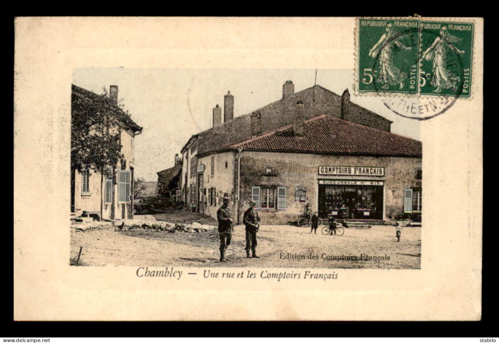 54 - CHAMBLEY - UNE RUE ET LES COMPTOIRS FRANCAIS - CARTE COLORISEE  - Chambley Bussieres