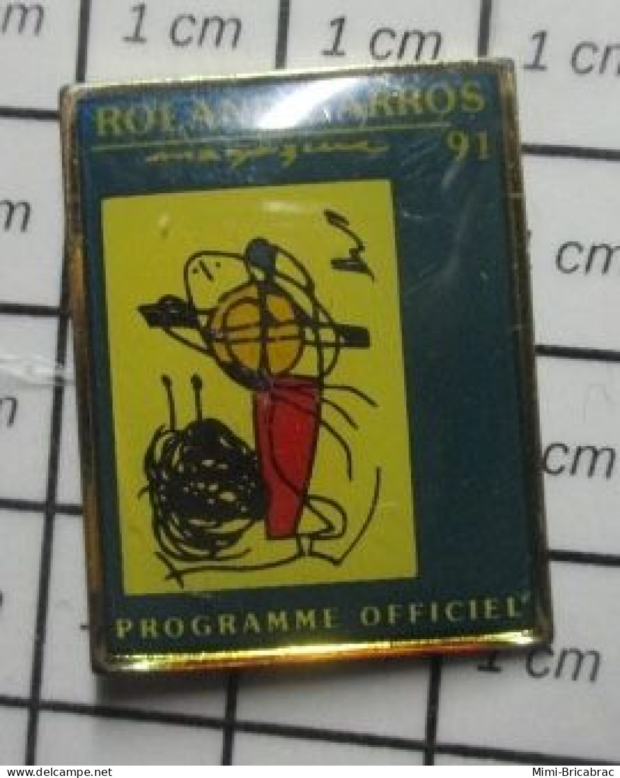 718A Pin's Pins / Beau Et Rare / SPORTS / TENNIS FFT PROGRAMME OFFICIEL ROLAND-GARROS 91 - Tennis