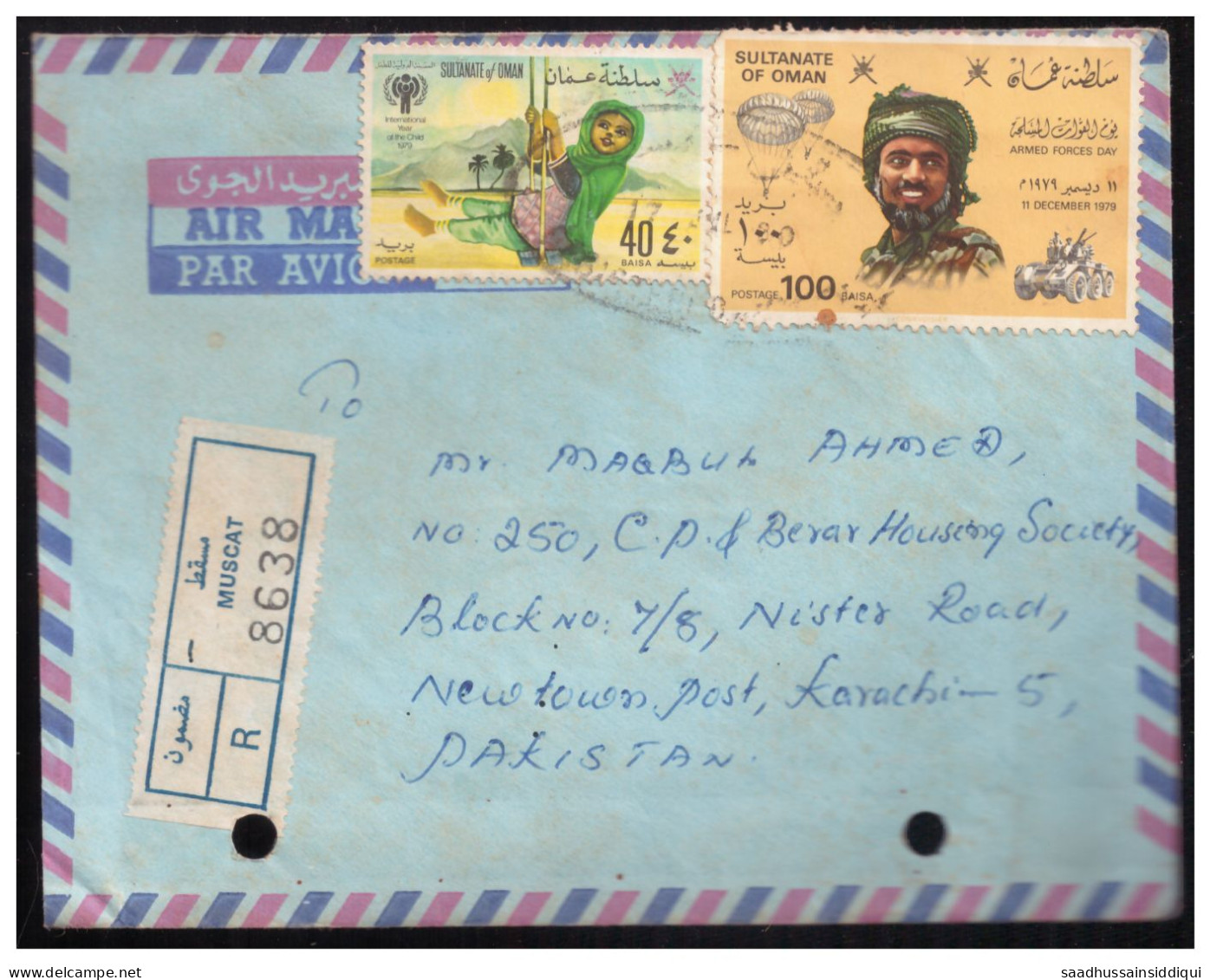 USED REGISTERED AIR MAIL COVER OMAN TO PAKISTAN TWO PUNCH HOLE ( 4 ) - Oman
