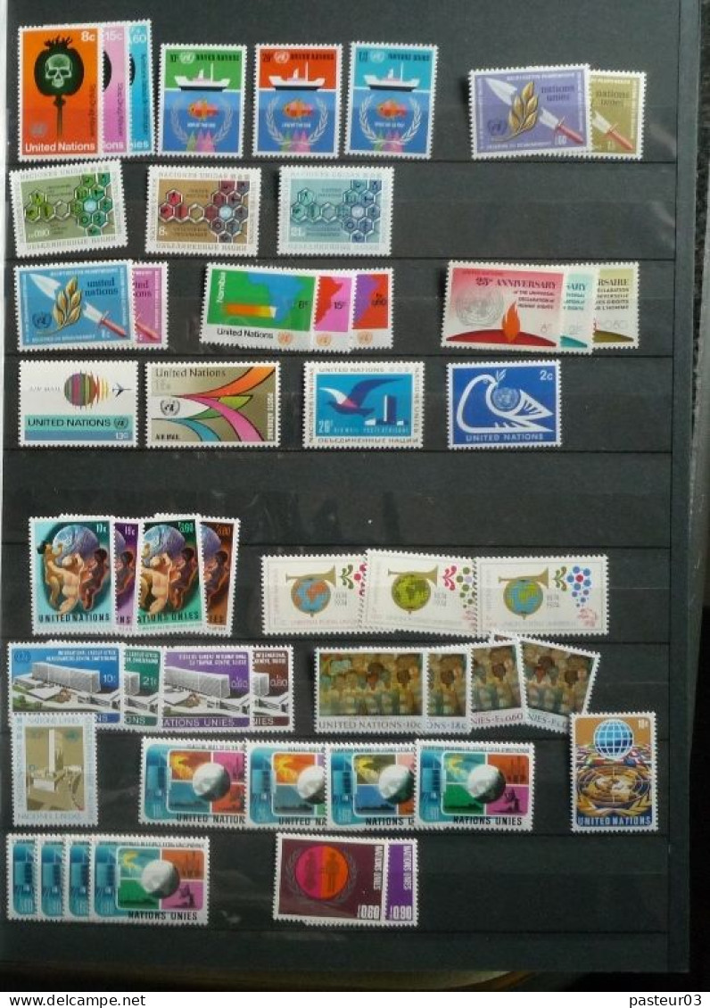 Nations Unies Collection nombre important de timbres et blocs et  plus 16 feuillets drapeaux