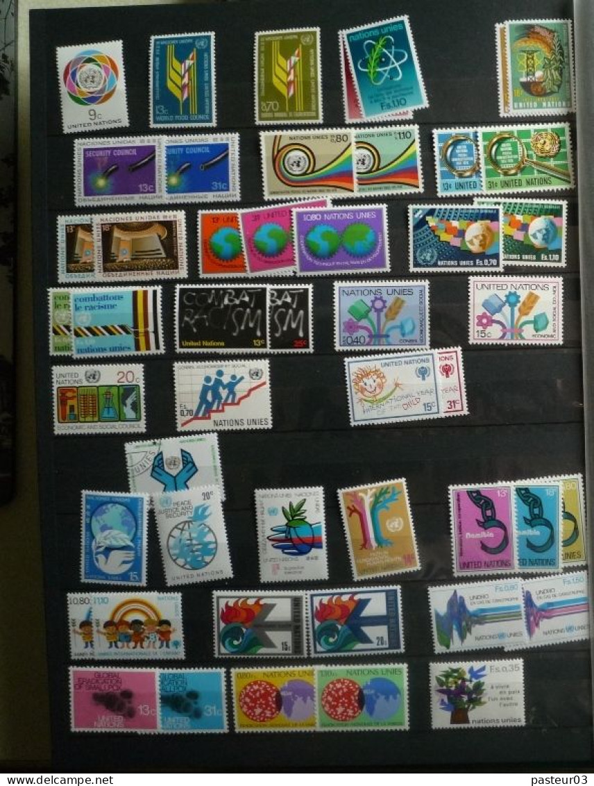 Nations Unies Collection nombre important de timbres et blocs et  plus 16 feuillets drapeaux