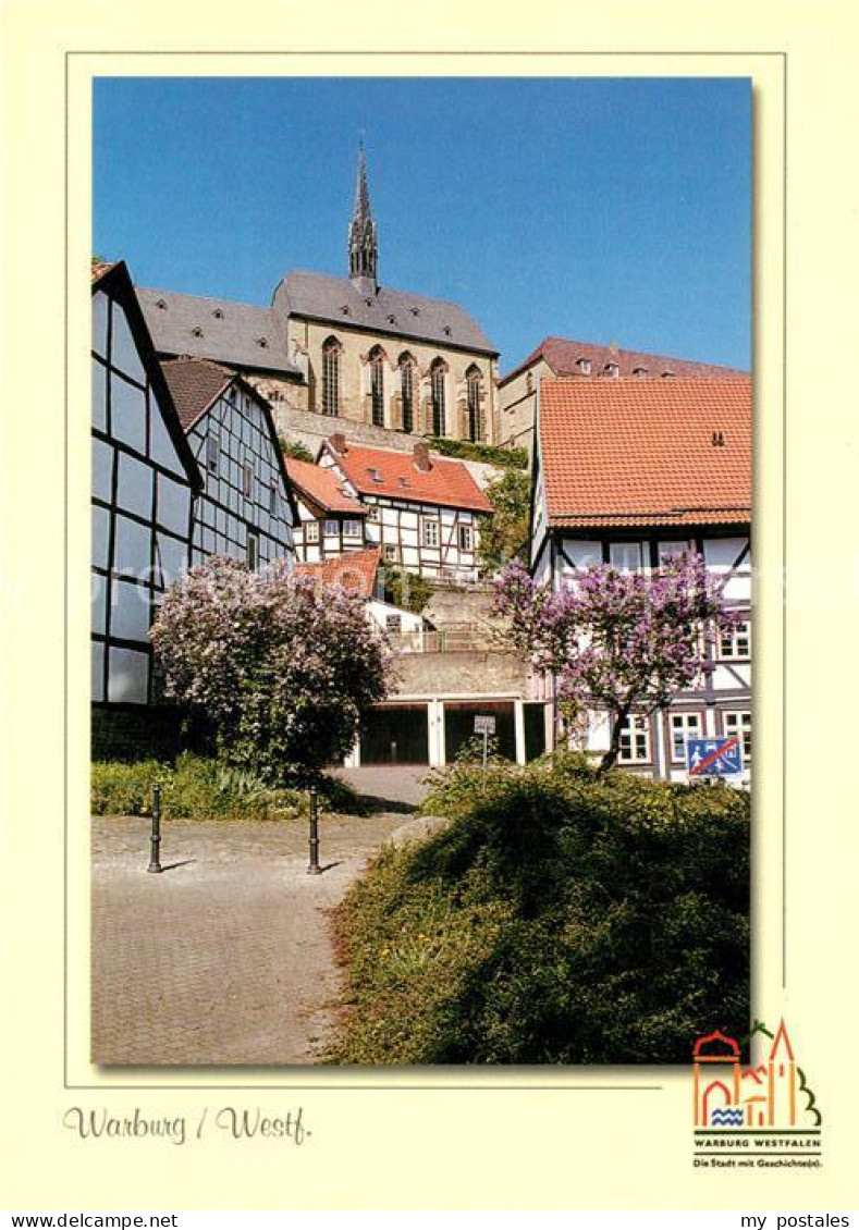 73177979 Warburg Westfalen Altstadt Fachwerkhaeuser Baumbluete Kirche Warburg We - Warburg