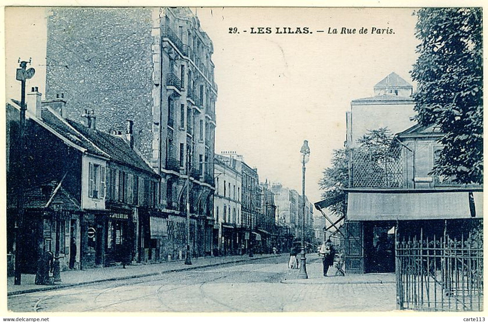 93 - B12948CPA - LES LILAS - La Rue De Paris - Parfait état - SEINE-SAINT-DENIS - Les Lilas