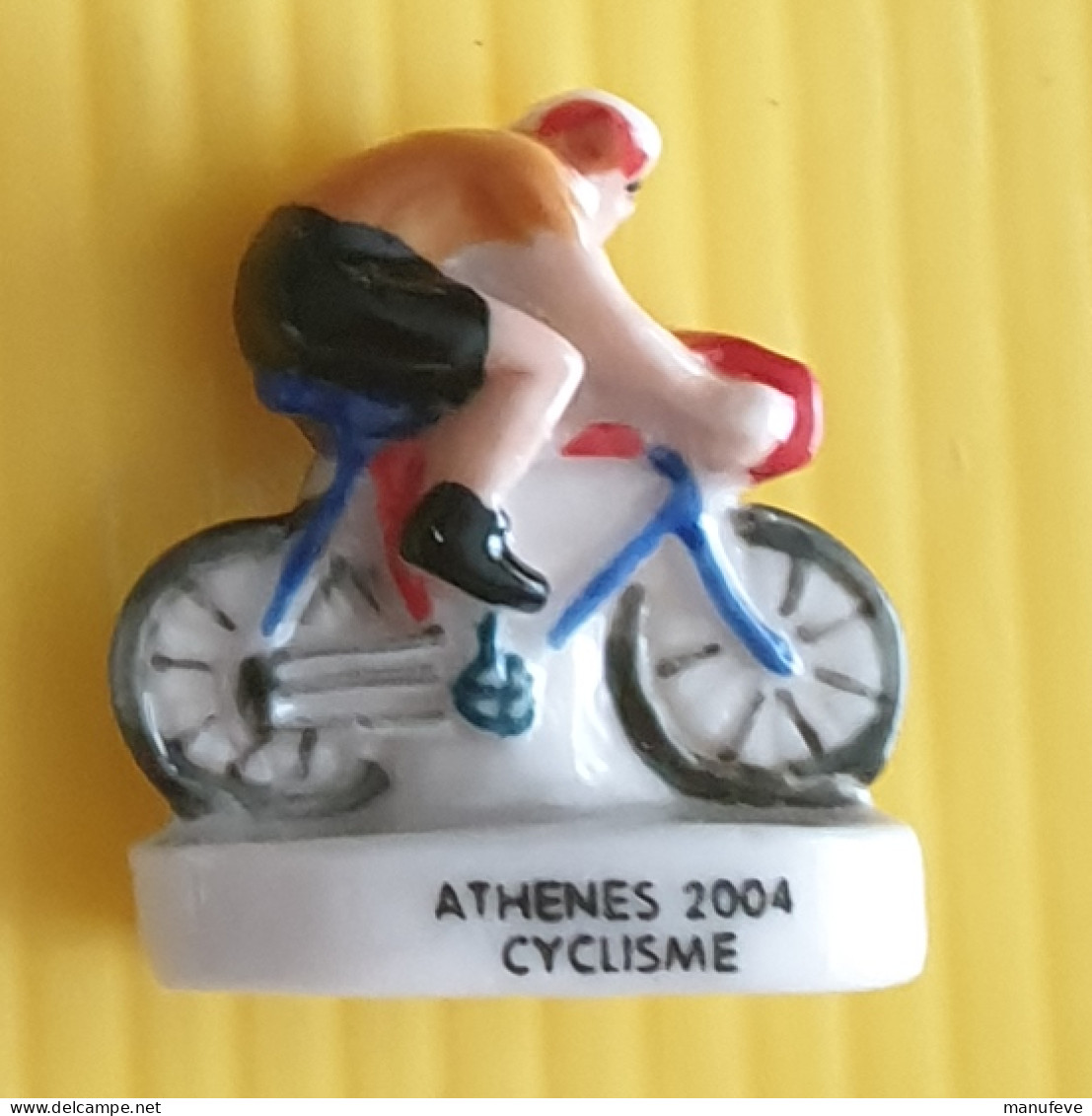 Fève   - Baguépi - Athènes 2004 -  Cyclisme - Deportes