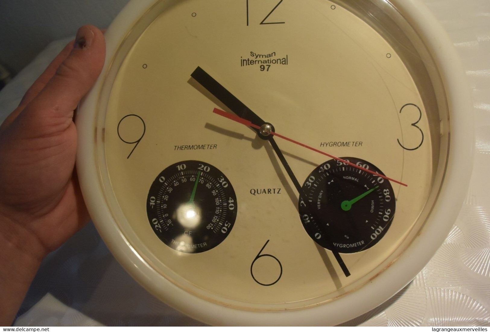 C83 Horloge Syman 1997 Thermomètre Hygromètre - Clocks