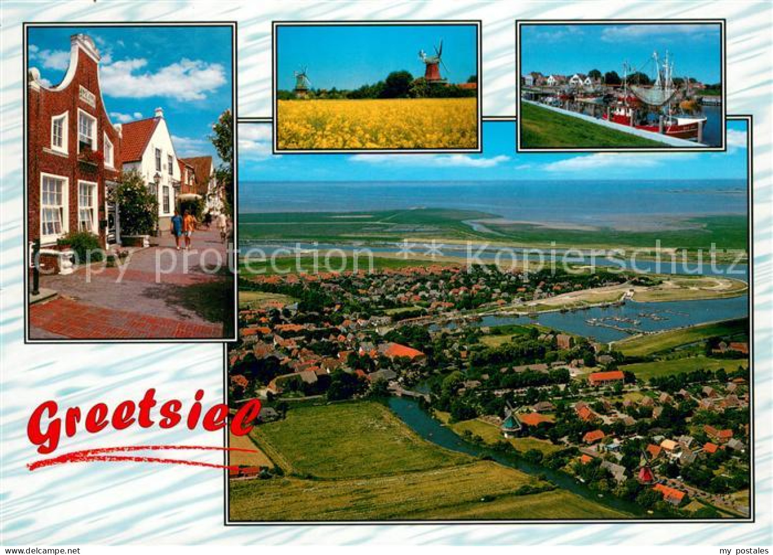 73615579 Greetsiel Friesenhaeuser Windmuehle Hafen Fliegeraufnahme Greetsiel - Krummhoern