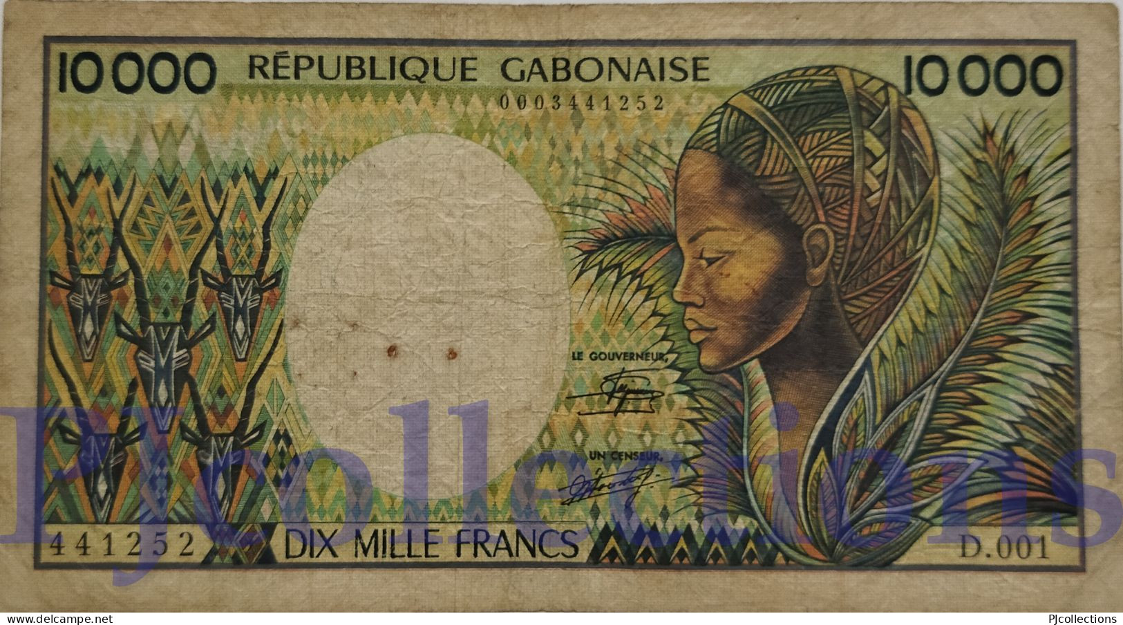 GABON 10000 FRANCS 1984 PICK 7a AVF W/PINHOLES - Gabon