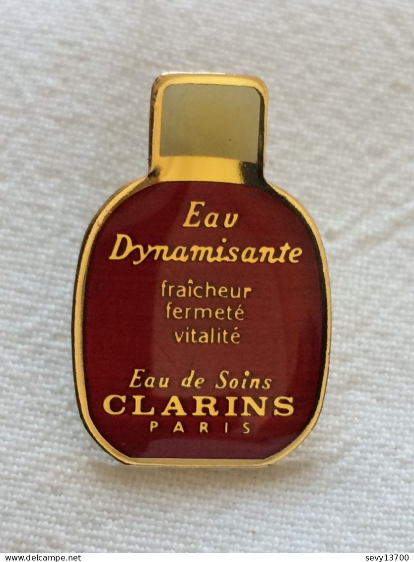 Pin's Vintage épinglette Publicitaire CLARINS PARIS - Parfum