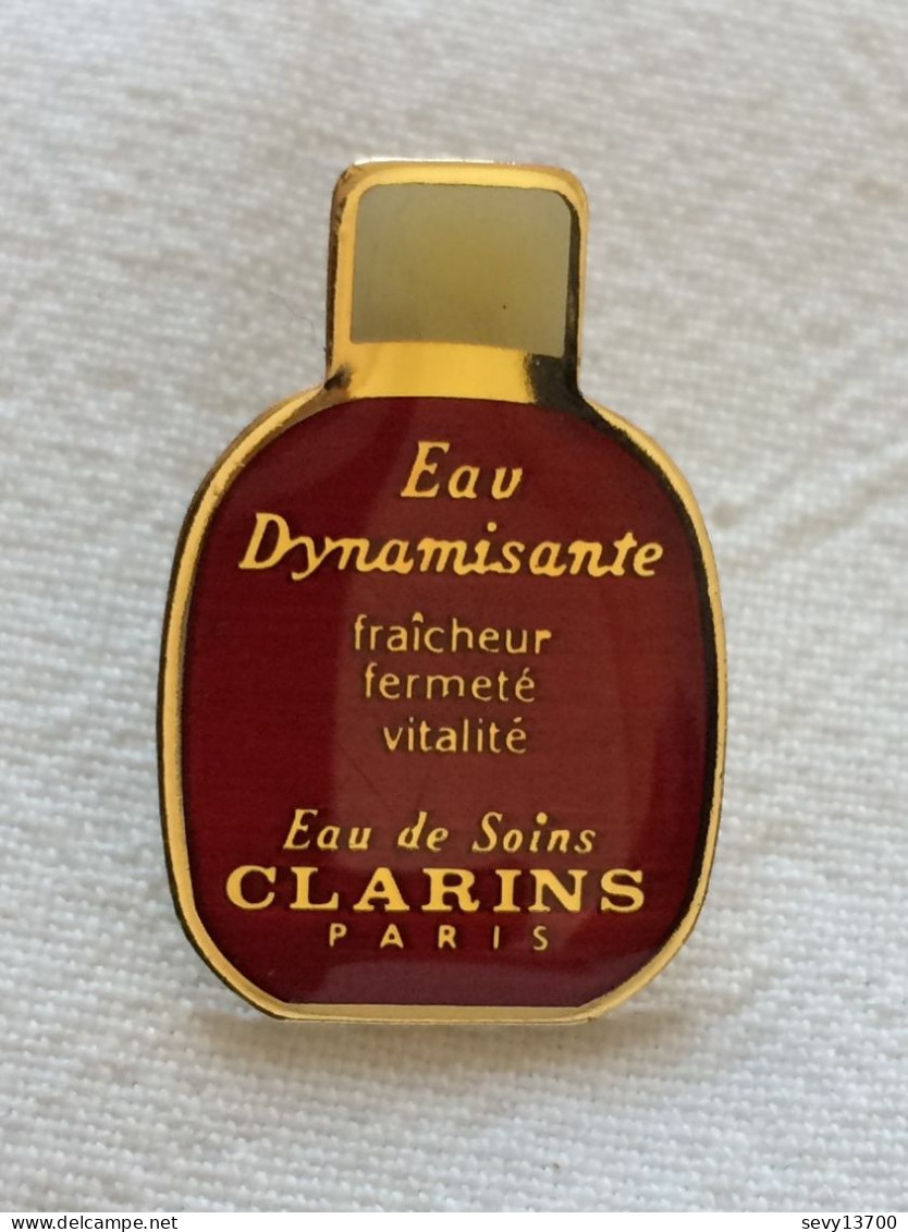 Pin's Vintage épinglette Publicitaire CLARINS PARIS - Perfumes