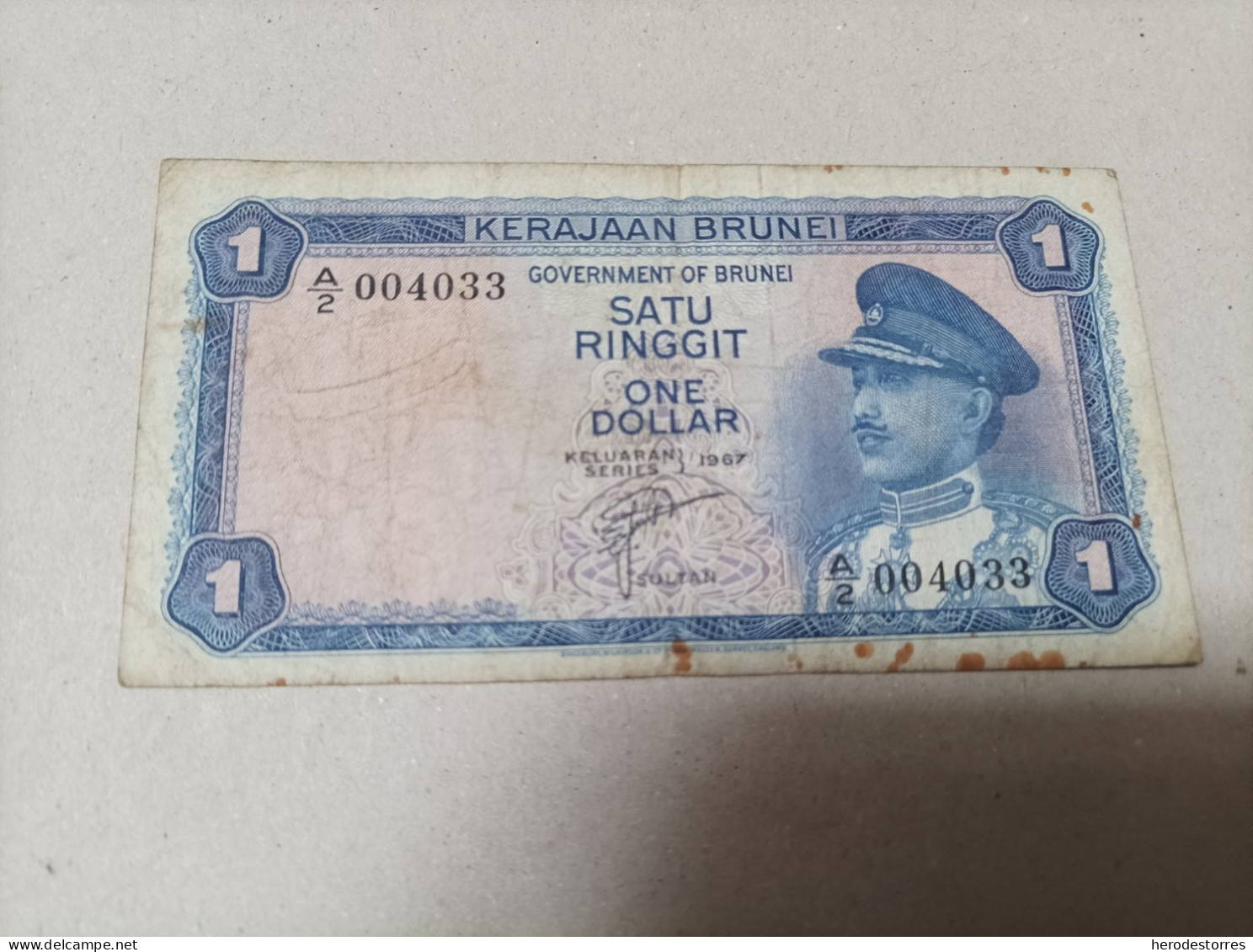 Billete Brunei, 1 Ringgit, Año 1967, Nº Bajisimo 004033, Serie A - Brunei