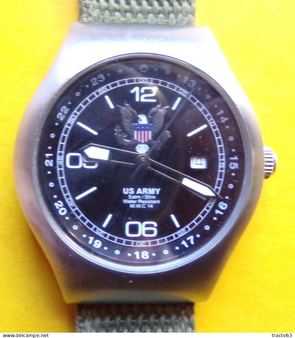 ARMEE AMERICAINE U.S : MONTRE US ARMY , WATER RESISTANT 50 METRES , AU DOS "THIS WE'LL DEFEND , SWISS MOVEMENT , ALL STA - Equipement