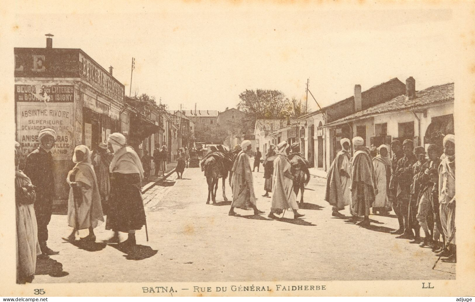 CPA - Algérie - BATNA -Rue Du Général Faidherbe - Absinthe Rivoire - Ref. LL N° 35 _ J. Bernard Papeterie Tabacs BATNA* - Batna