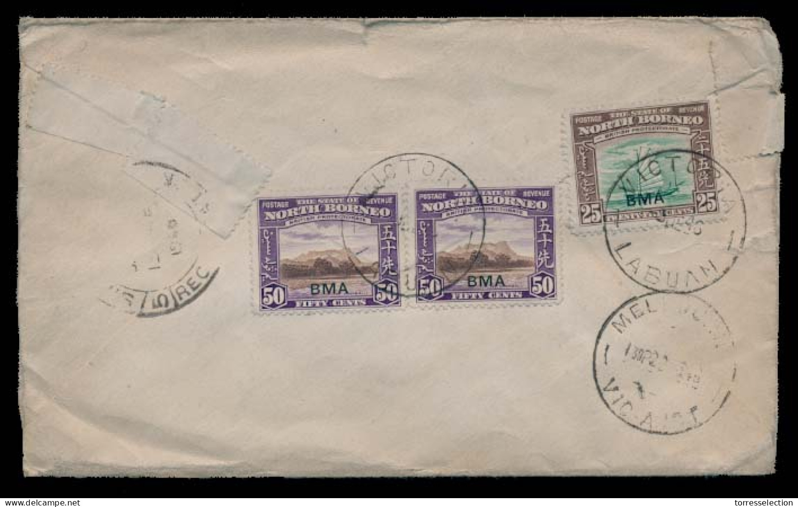 MALAYSIA. 1946 (9 Dec). Labuan BMA. Victoria - Australia / Melbourne (20 Dec). Reverse Airmail Reg Multifkd Ovptd Env 1$ - Malaysia (1964-...)