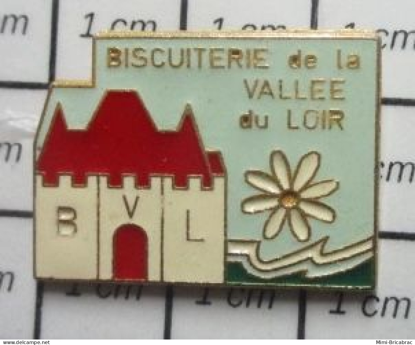 511b Pin's Pins / Beau Et Rare : ALIMENTATION / BVL BISCUITERIE DE LA VALLEE SU LOIR CHATEAU MARGUERITE PAQUERETTE - Alimentation