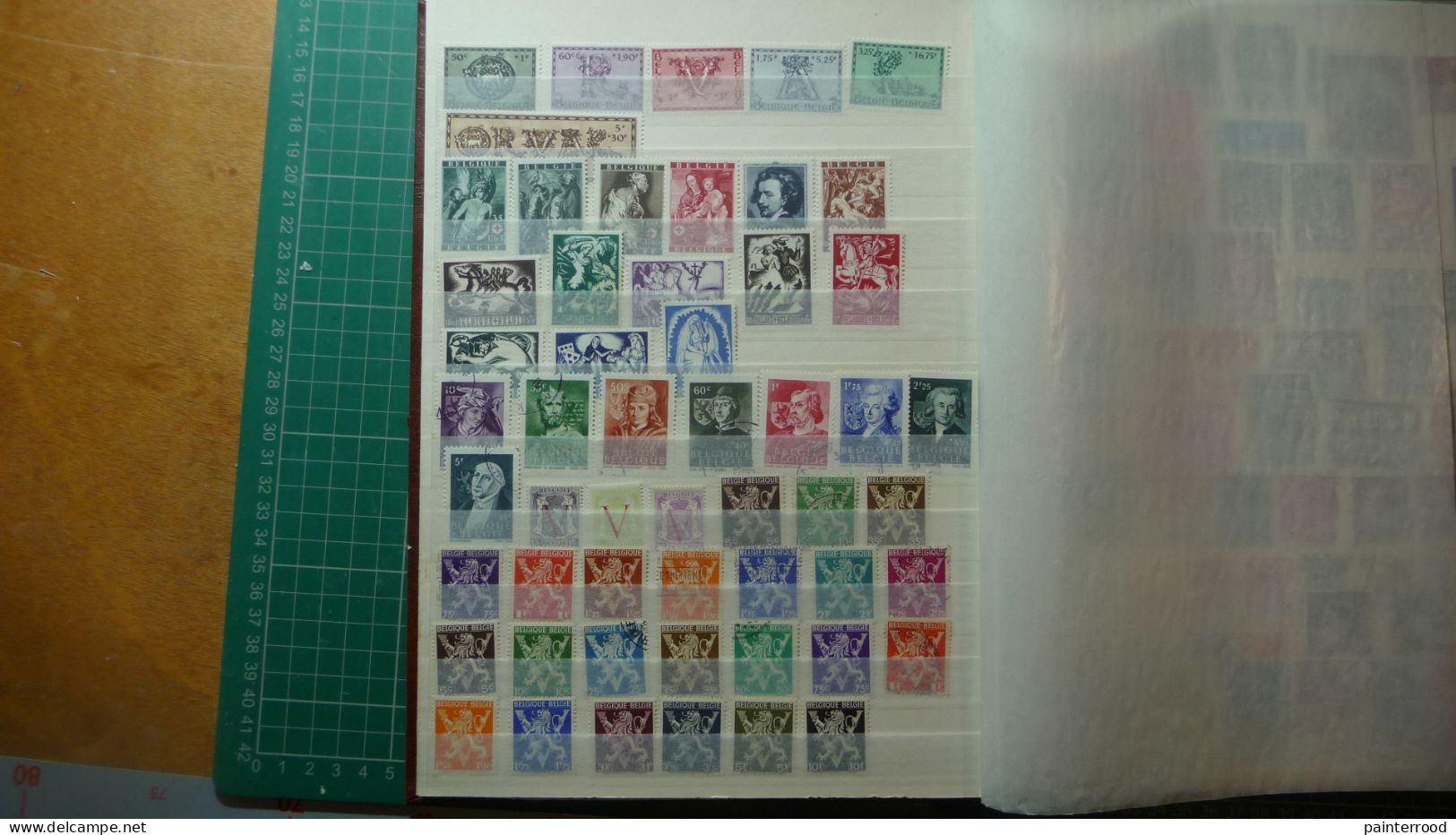 Album postzegels België 1954 - 1984 ongeveer een 800-tal zegels met enige voorgefrankeerde postkaarten icl. Congo