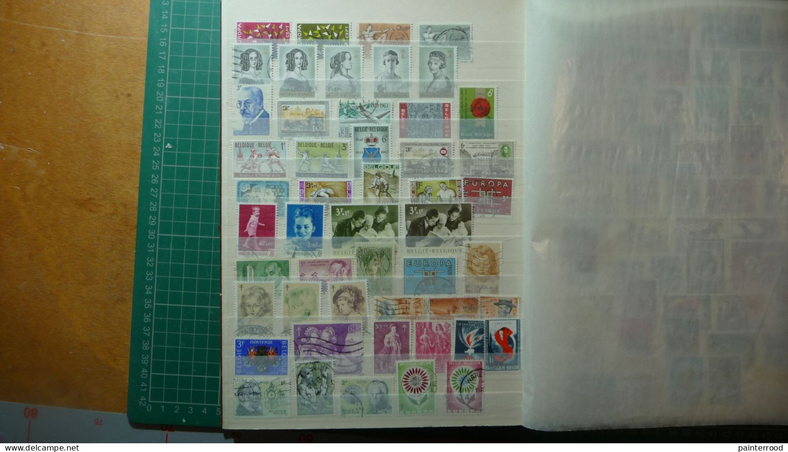 Album postzegels België 1954 - 1984 ongeveer een 800-tal zegels met enige voorgefrankeerde postkaarten icl. Congo