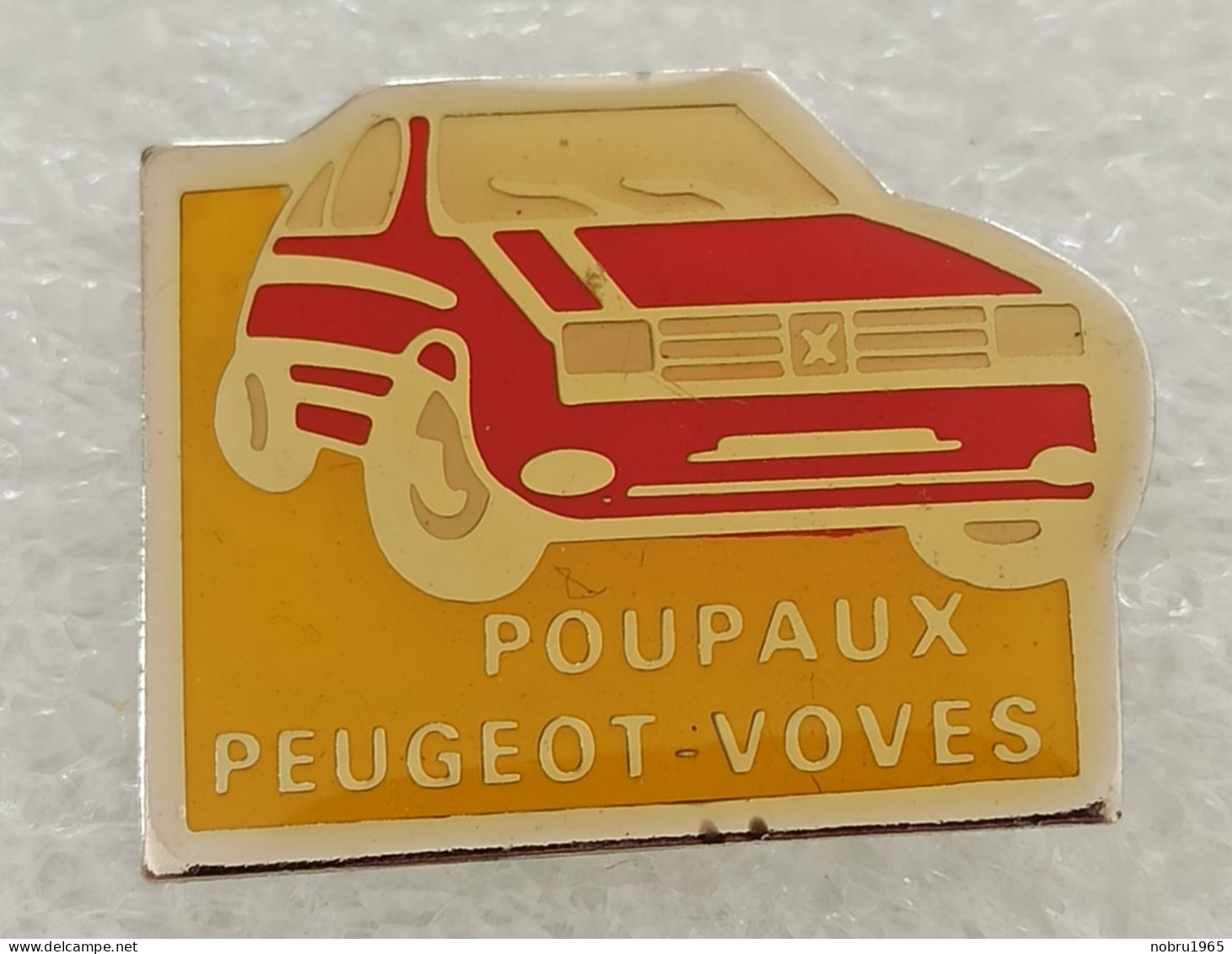 Pin's Peugeot 106. Garage Poupaux à Voves - Peugeot