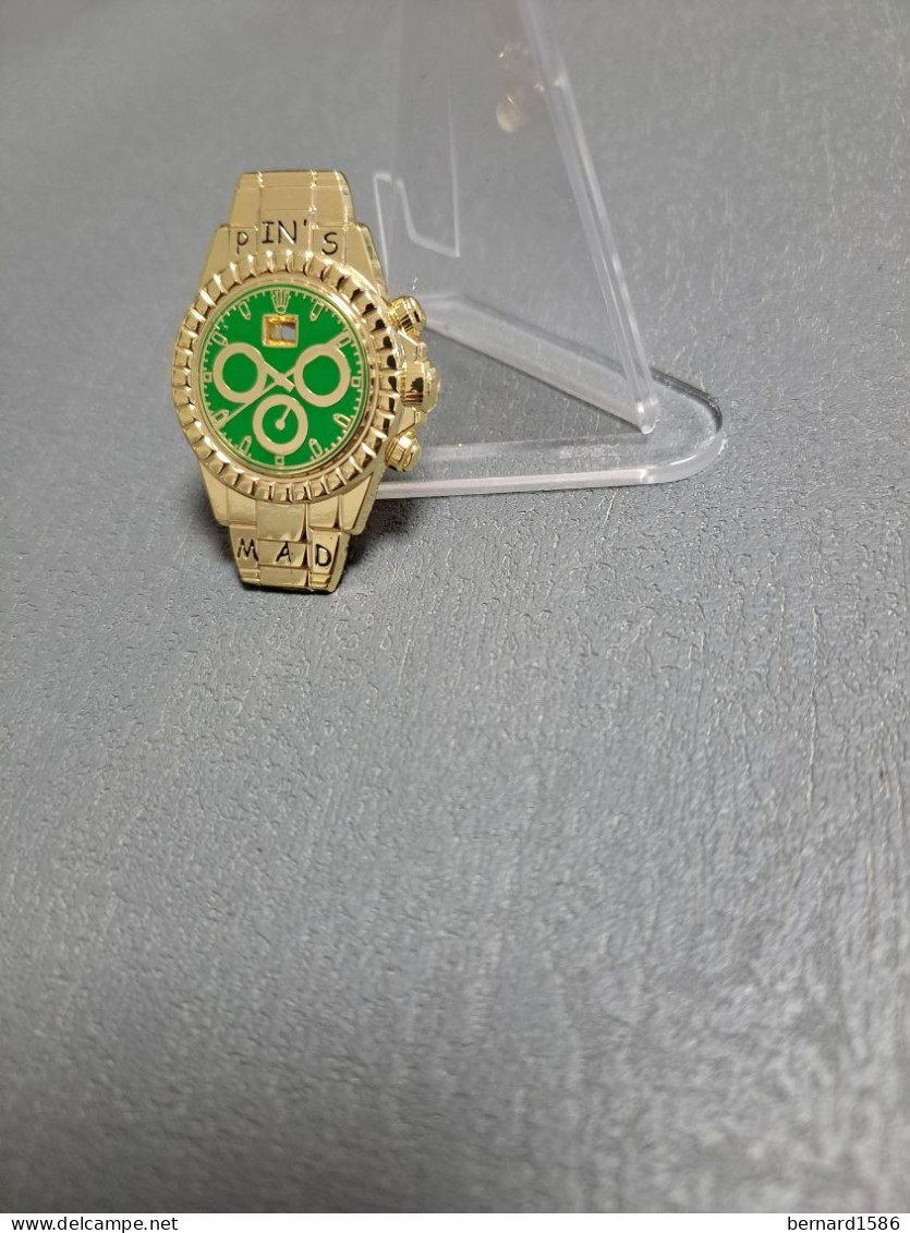 1 PIN'S MONTRE EN 3D ROLEX MAD BGI - Arthus Bertrand