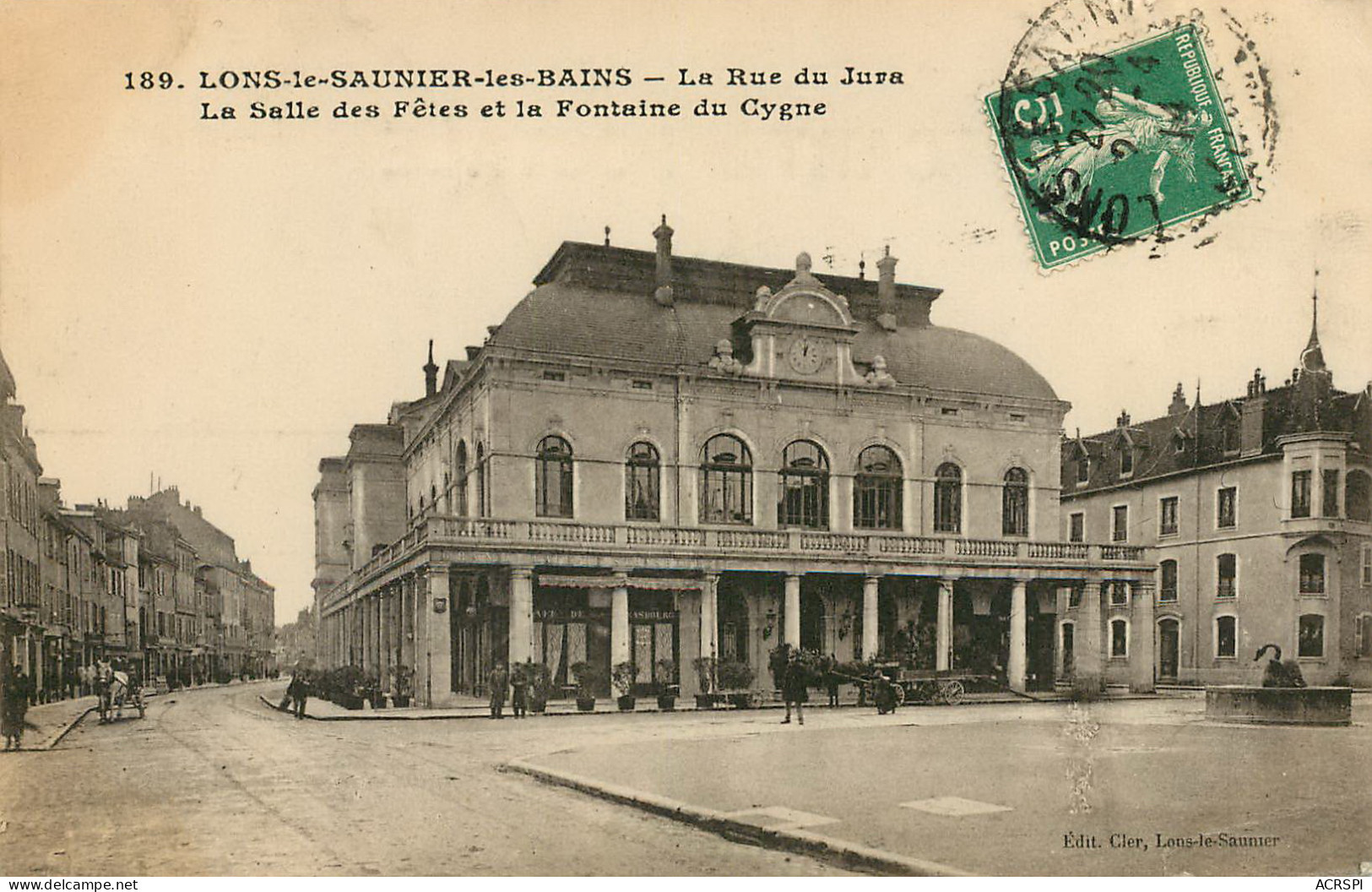 Lons Le Saunier - La Rue Du Jura - La Salle Des Fêtes Theatre Et La Fontaine Du Cygne  (scan Recto-verso) PFRCR00055 P - Lons Le Saunier