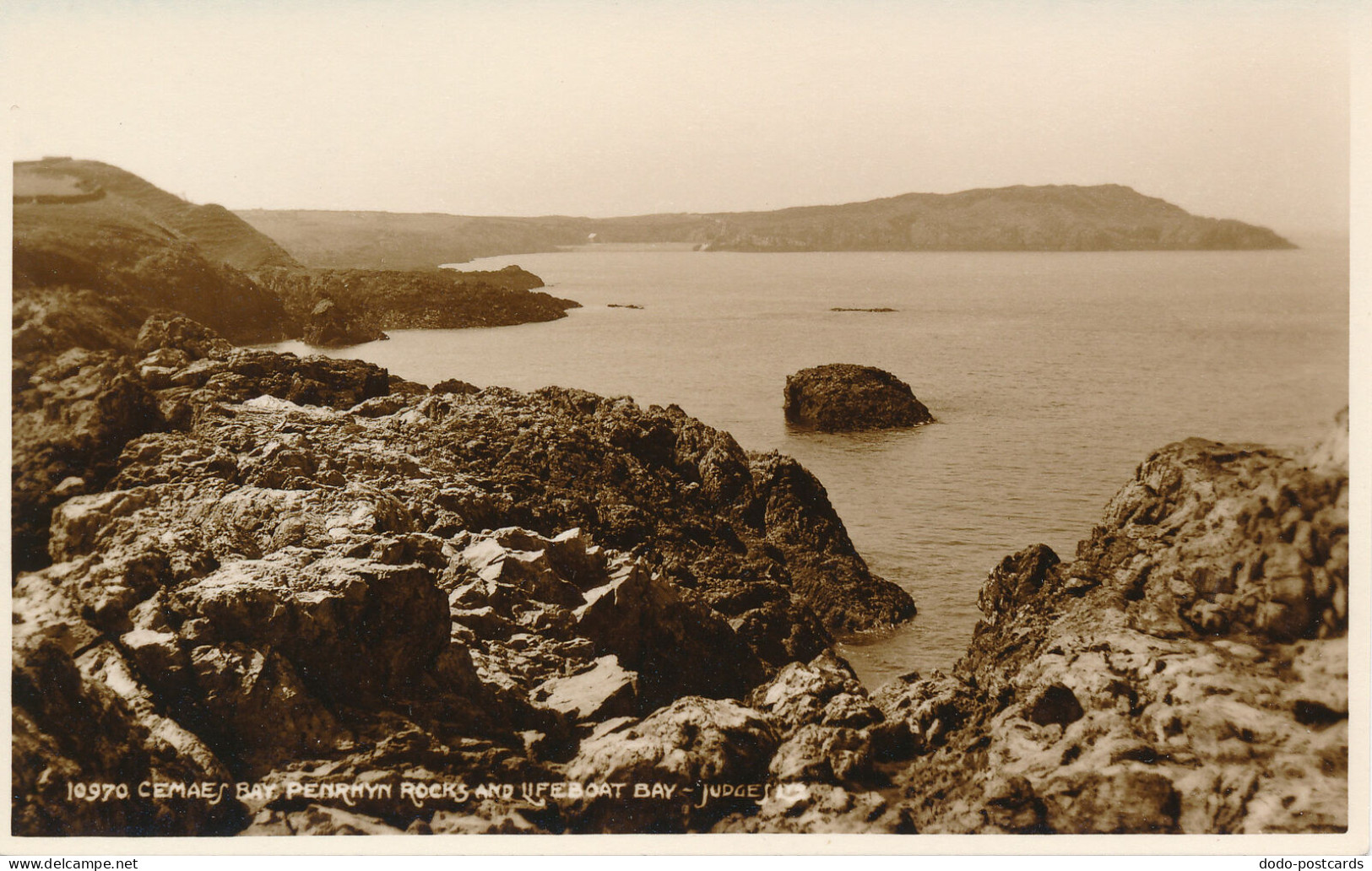 PC41672 Cemaes Bay. Penrhyn Rocks And Lifeboat Bay. Judges Ltd. No 10970 - World