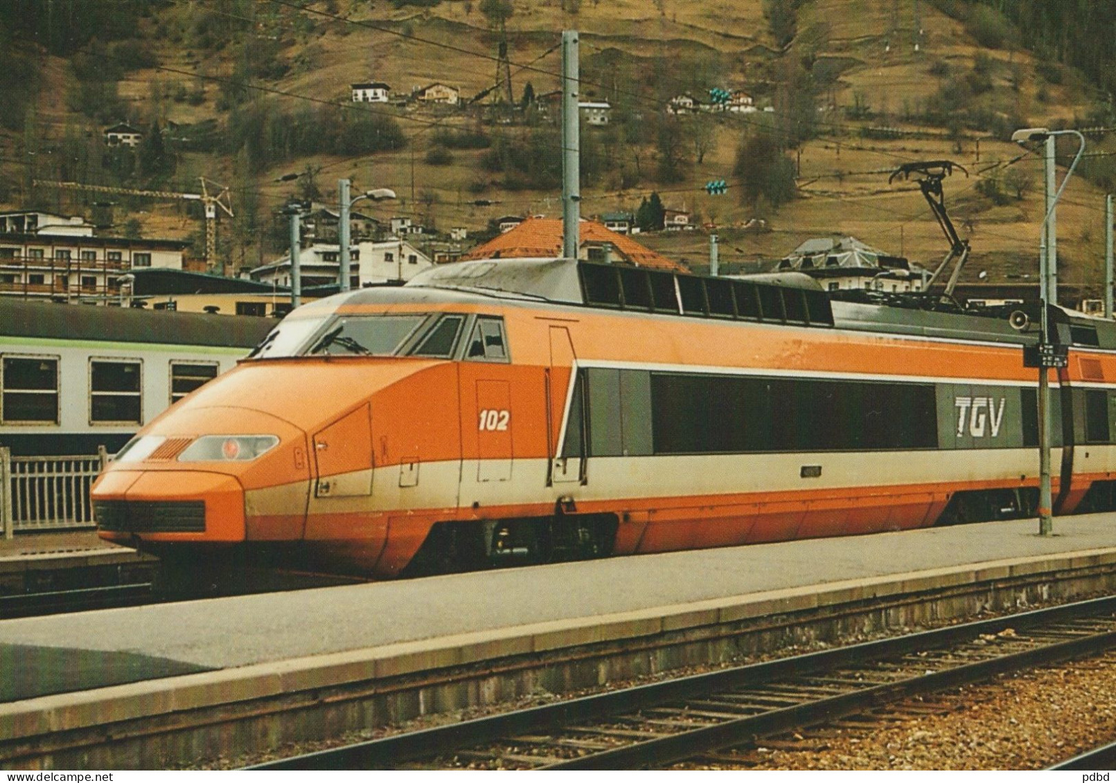TGV 57 . Sud-Est . Rame N° 102 . Bourg Saint Maurice . TGV Inaugural 28 01 1990 . Photo Baliziaux . - Trains