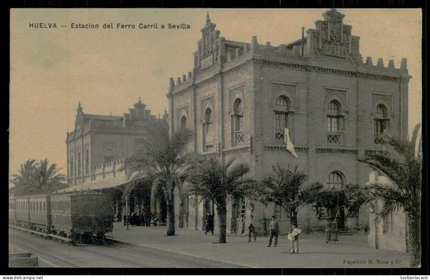 SPAIN - HUELVA - Estacion Del Ferro Carril A Sevilla. (  Ed. Papelaria M.Mora Y Ca.) Carte Postale - Stations With Trains