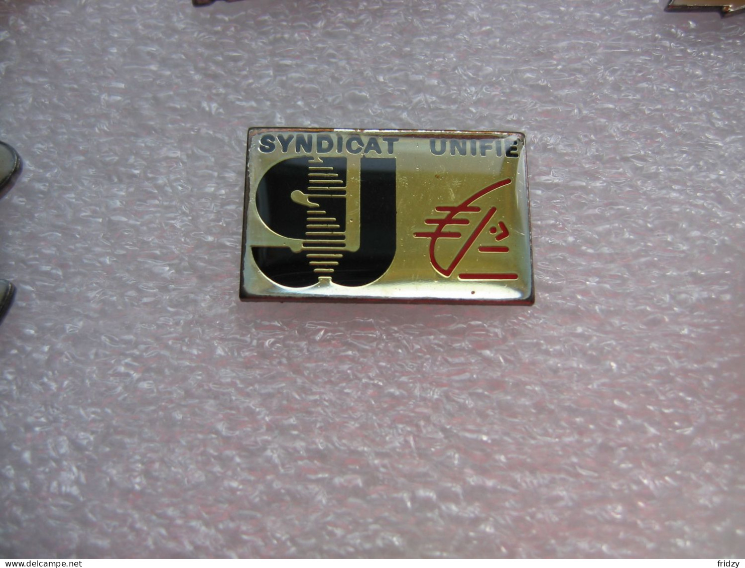 Pin's Du Syndicat Unifié De La Caisse D'épargne - Administración