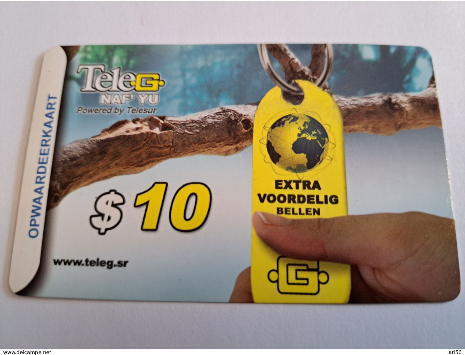 SURINAME US $10  / UNITS GSM  PREPAID / EXTRA VOORDELIG BELLEN/ WORLDSPHERE ON KEYCHAIN /    MOBILE CARD    **16402 ** - Suriname