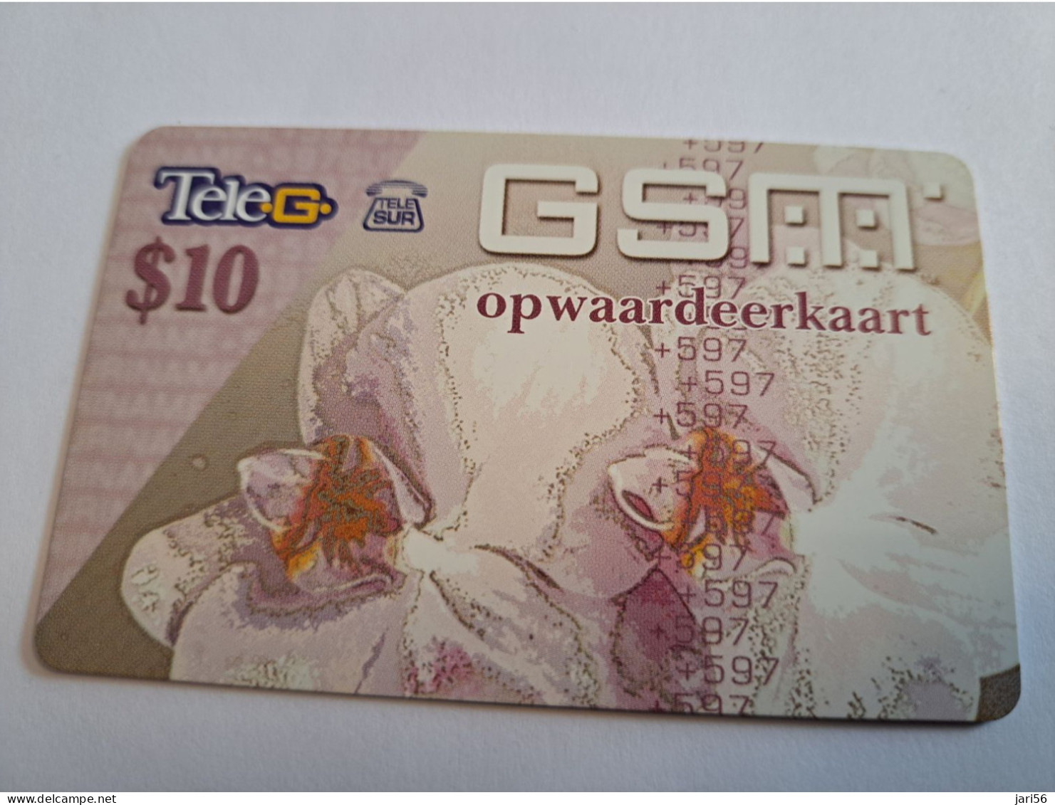 SURINAME US $10 UNIT GSM  PREPAID  FLOWER MOBILE CARD /WHITE FLOWER/ THICK CARD!!          **16423 ** - Surinam