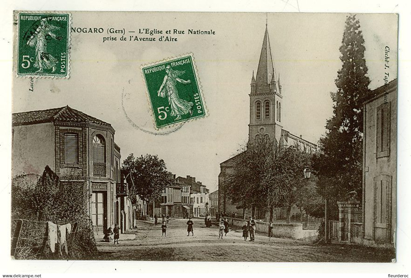 32 - DB50767CPA - NOGARO - L'église Et Rue Nationale Prise De L'avenue D'Aire - Très Bon état - GERS - Nogaro