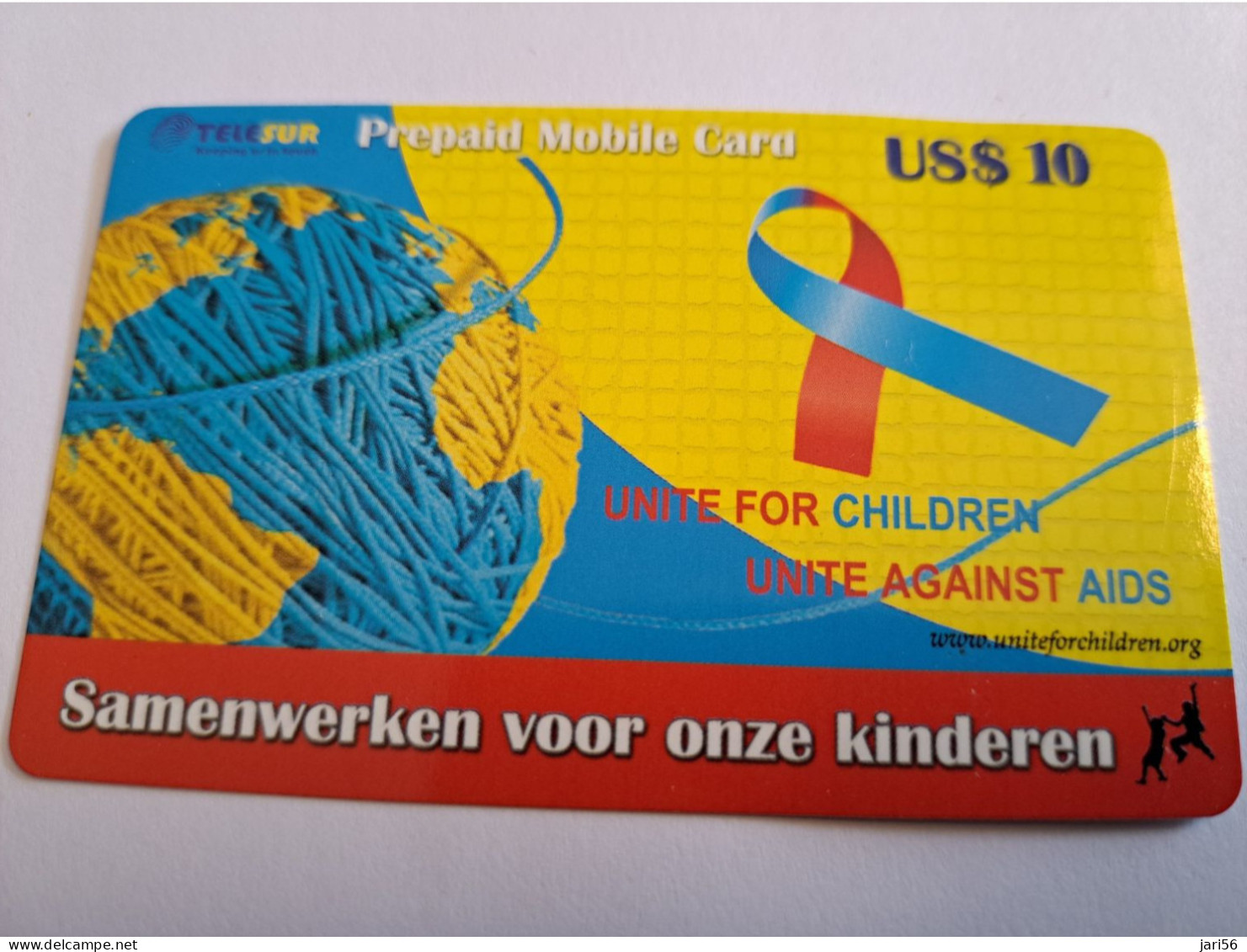 SURINAME US $ 10,-     PREPAID / TELESUR  /  UNITE AGAINST AIDS   /      / FINE USED CARD            **16432** - Surinam