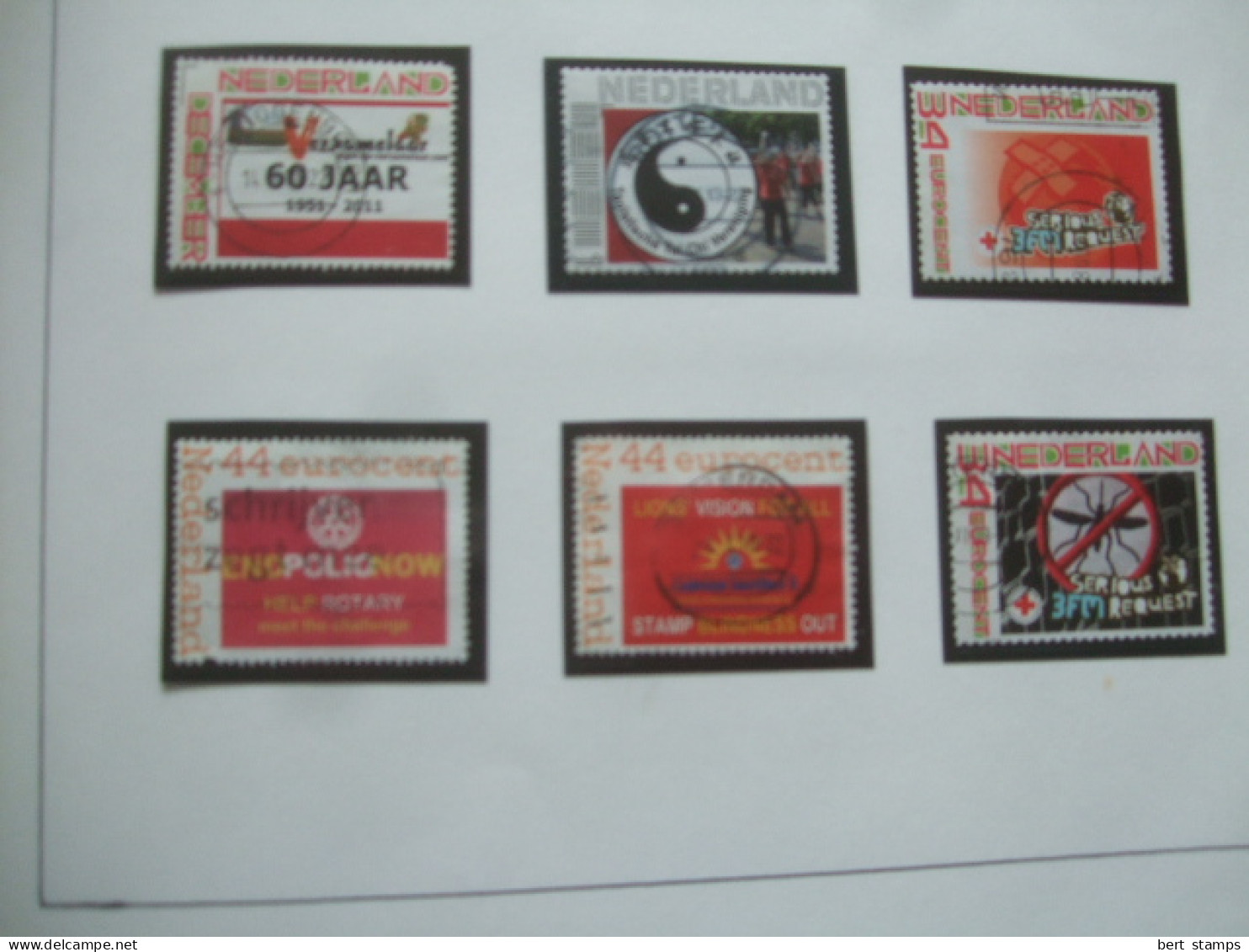Verzameling persoonlijke postzegels op album bladen